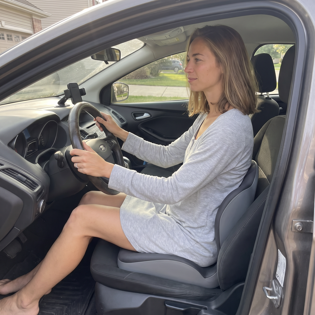 Driving on the dark gray seat cushion